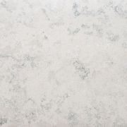 A slab of Nile Quartz Concrete Oyster worktop material, featuring cool grey mottling on a warm off-white base. A unique concrete-effect quartz for modern kitchens, supplied and fitted by S T Stoneworks in Essex