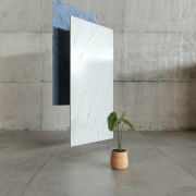Silestone Ethereal Noctis, showing its versatility alongside industrial concrete and natural textures like denim and plants