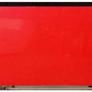 Full slab of ST Quartz Red Sparkle, a vibrant red quartz with a brilliant, reflective mirror-fleck sparkle throughout