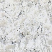 ST Quartz Snowdon slab, featuring a crisp white base with soft grey swirls and dark, rocky flecks