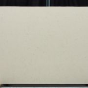 Full slab of ST Quartz Windermere, a warm, creamy off-white quartz with a very fine, subtle texture reminiscent of natural limestone