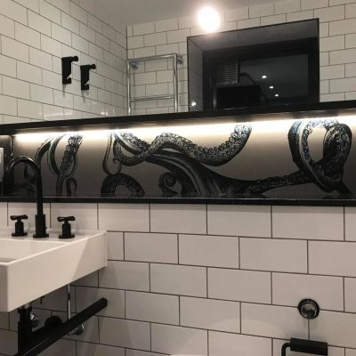 This 5 star hotel has 300 rooms that ST Stone Works were commissioned to Make and install bespoke printed stone and install tiles to every room.