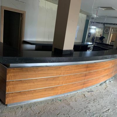 Phase one of a full hotel refurb. An 8 metre long curved counter with thermo-formed skirts to follow the curve.