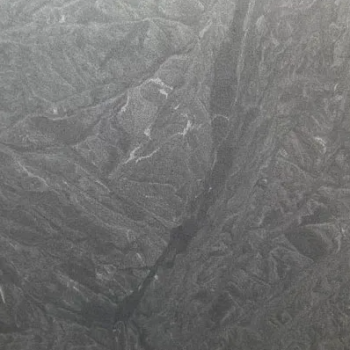 Virginia Black granite slab, deep charcoal-black colour and leathered texture that gives it a soft sheen and a slate-like appearance